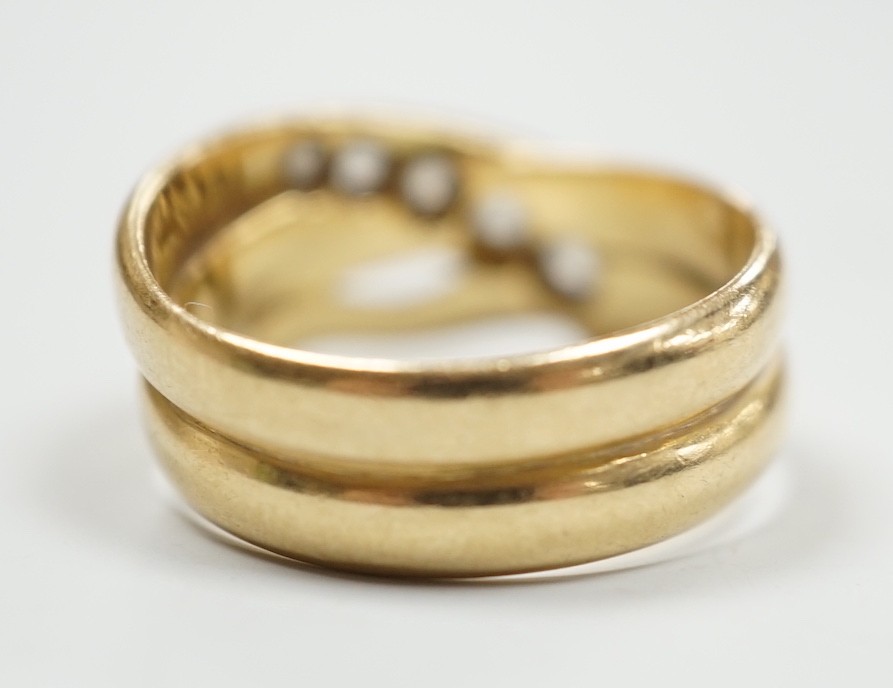 A late Victorian18ct gold and graduated five stone diamond set serpent ring, Hallmarked for Chester, 1897, size P/Q, gross weight 7.3 grams.